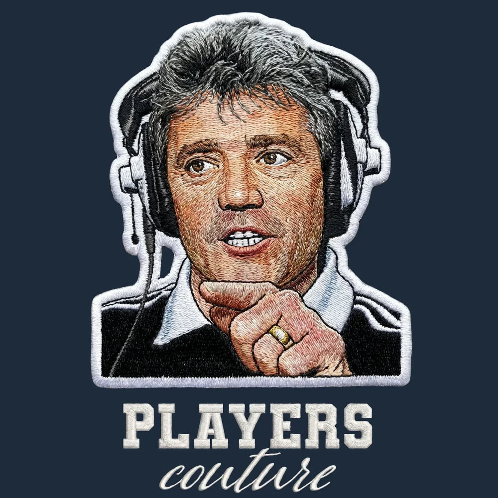 Kevin Keegan Love It Badge Men's Hoodie – navy close-up detail shot of the Kevin Keegan Love It Players Couture logo design