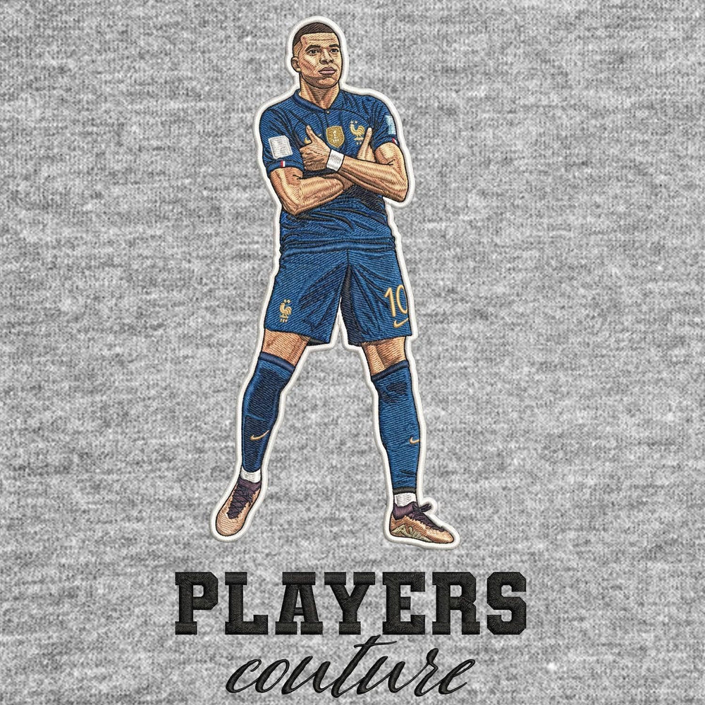 Kylian Mbappe Badge Men's Hoodie – grey close-up detail shot of the Kylian Mbappe Players Couture logo design