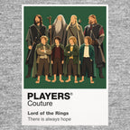 The Lord of the Rings the Fellowship travelling beneath the Ring's gold circle and the mountain silhouette of Middle-earth Icon Frame artwork in grey