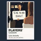 Love Actually the interconnected London ensemble beneath Christmas lights and airport-arrival warmth Icon Frame artwork in navy