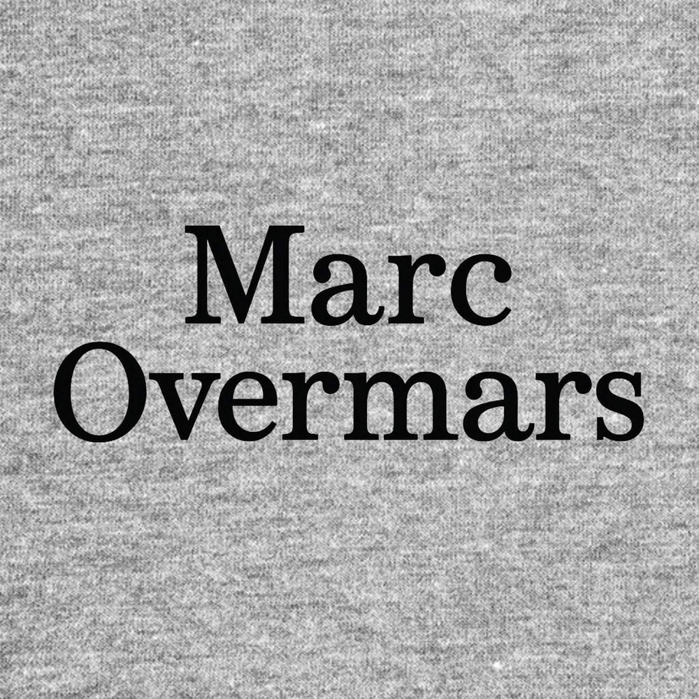 Marc Overmars Logo Men's T-Shirt – grey close-up detail shot of the Marc Overmars Players Couture logo design