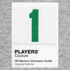 Masters Caddy 1 Jersey Frame Men's T-Shirt – grey close-up detail shot of the Masters Caddy 1 Players Couture logo design