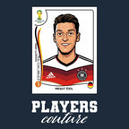 Mesut Ozil World Cup Sticker Men's T-Shirt – navy close-up detail shot of the Mesut Ozil World Cup Players Couture logo