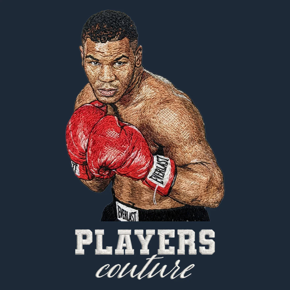 Mike Tyson Badge Men's Hoodie – white close-up detail shot of the Mike Tyson Players Couture logo design