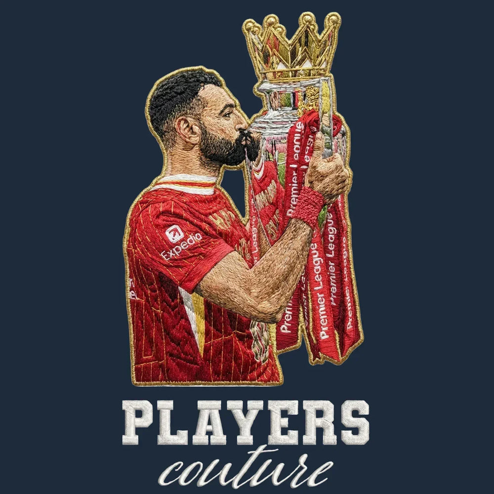 Mo Salah Champion Badge Men's Hoodie – navy close-up detail shot of the Mo Salah Players Couture logo design