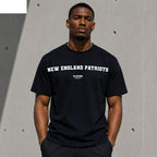 New England Patriots Men's T-Shirt — lifestyle photo, Navy t-shirt
