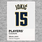 Nikola Jokic 15 Jersey Frame Men's T-Shirt – grey close-up detail shot of the Nikola Jokic 15 Players Couture logo design