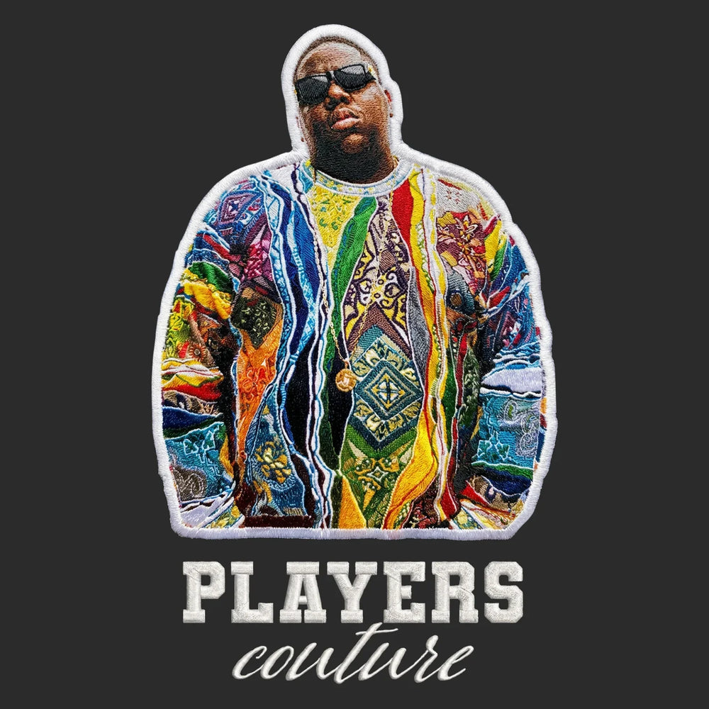 Notorious B.I.G. Badge Men's Hoodie – white close-up detail shot of the Notorious B.I.G. Players Couture logo design