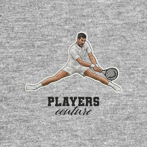 Novak Badge Men's Hoodie – black close-up detail shot of the Novak Djokovic Players Couture logo design