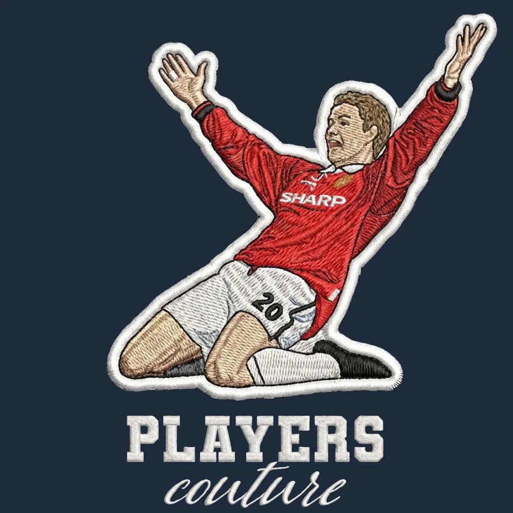 Ole Gunnar Solskjaer Badge Men's Hoodie – navy close-up detail shot of the Ole Gunnar Solskjaer Players Couture logo design