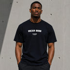 Oscar Bobb Men's T-Shirt — lifestyle photo, Navy t-shirt