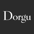 Patrick Dorgu Logo Men's Hoodie – black close-up detail shot of the Patrick Dorgu Players Couture logo design