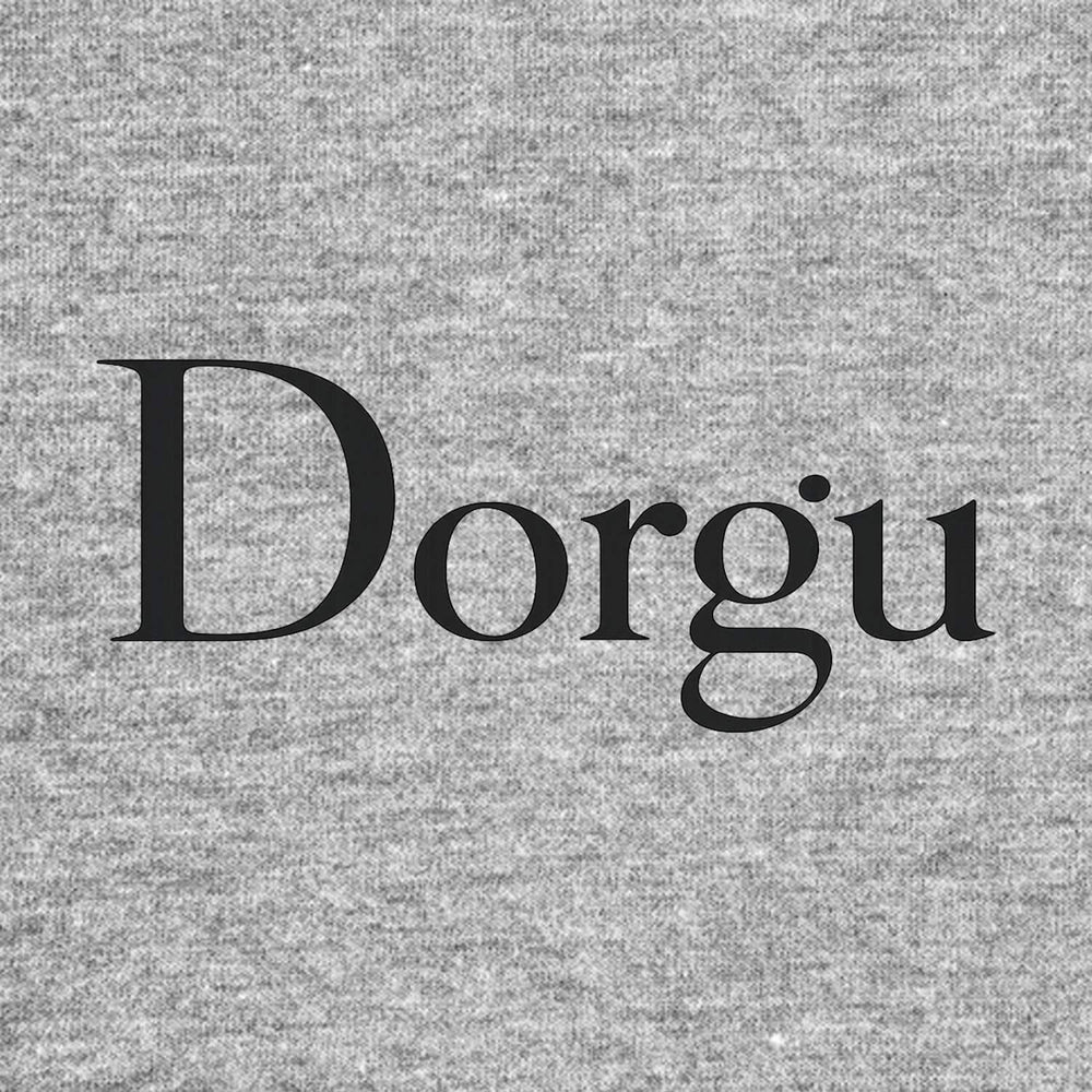 Patrick Dorgu Logo Men's Hoodie – grey close-up detail shot of the Patrick Dorgu Players Couture logo design
