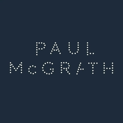 Paul McGrath Logo Men's Hoodie – navy close-up detail shot of the Paul McGrath Players Couture logo design