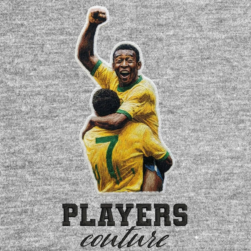 Pele Celebration Badge Men's Hoodie – grey close-up detail shot of the Pele Celebration Players Couture logo design