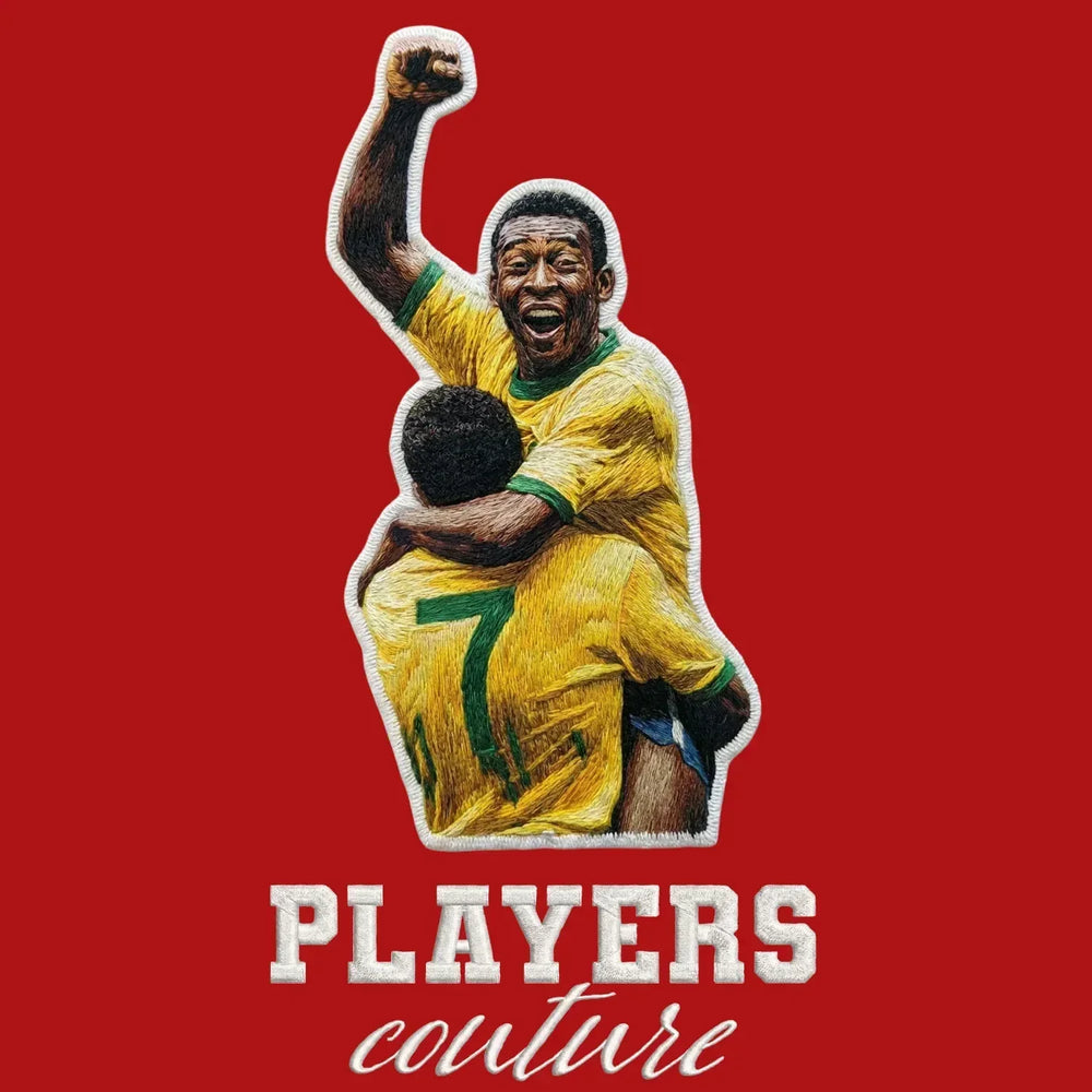 Pele Celebration Badge Men's Hoodie – red close-up detail shot of the Pele Celebration Players Couture logo design