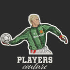Peter Schmeichel Badge Men's Hoodie – black close-up detail shot of the Peter Schmeichel Players Couture logo design