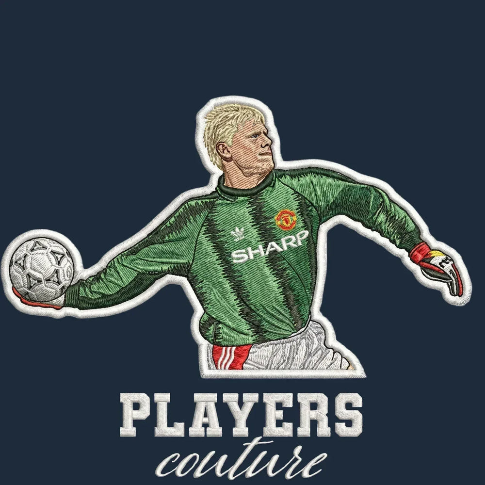 Peter Schmeichel Badge Men's Hoodie – navy close-up detail shot of the Peter Schmeichel Players Couture logo design