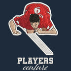 Robbie Fowler Celebration Badge Men's Hoodie – navy close-up detail shot of the Robbie Fowler Celebration Players Couture