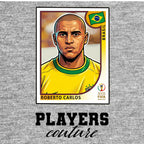 Roberto Carlos World Cup Sticker Men's T-Shirt – close-up detail shot of the Roberto Carlos World Cup Players Couture logo