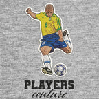 Roberto Carlos Badge Men's Hoodie – grey close-up detail shot of the Roberto Carlos Players Couture logo design