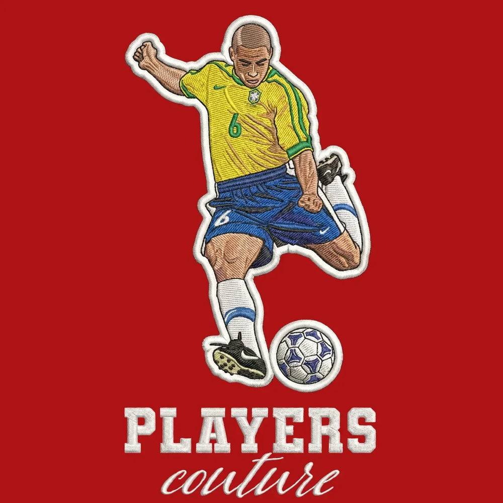 Roberto Carlos Badge Men's Hoodie – red close-up detail shot of the Roberto Carlos Players Couture logo design