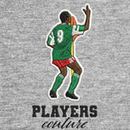 Roger Milla Badge Men's Hoodie – grey close-up detail shot of the Roger Milla Players Couture logo design