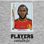 Romelu Lukaku World Cup Sticker Men's T-Shirt – close-up detail shot of the Romelu Lukaku World Cup Players Couture logo