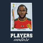 Romelu Lukaku World Cup Sticker Men's T-Shirt – close-up detail shot of the Romelu Lukaku World Cup Players Couture logo