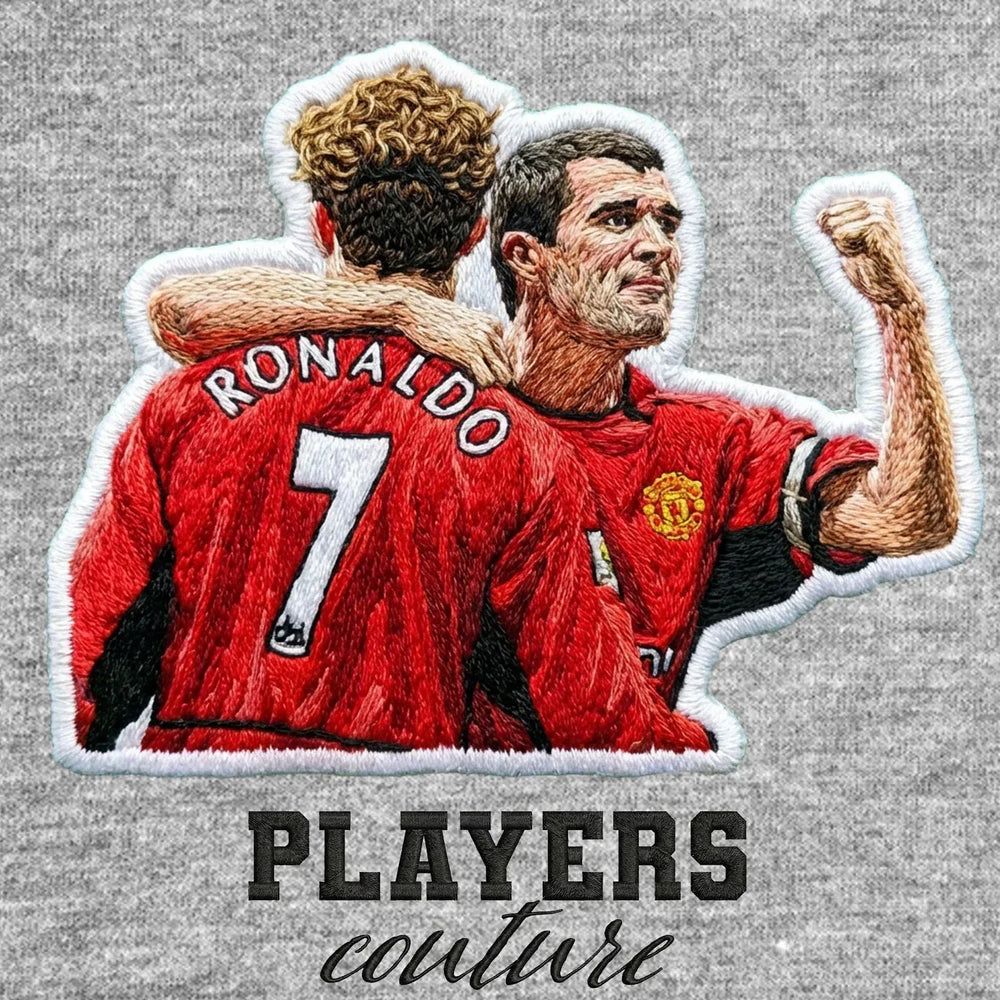 Roy Keane Badge Men's Hoodie – grey close-up detail shot of the Roy Keane Players Couture logo design