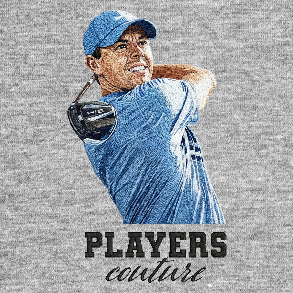 Rory McIlroy Swing Badge Men's Hoodie – black close-up detail shot of the Rory McIlroy Swing Players Couture logo design