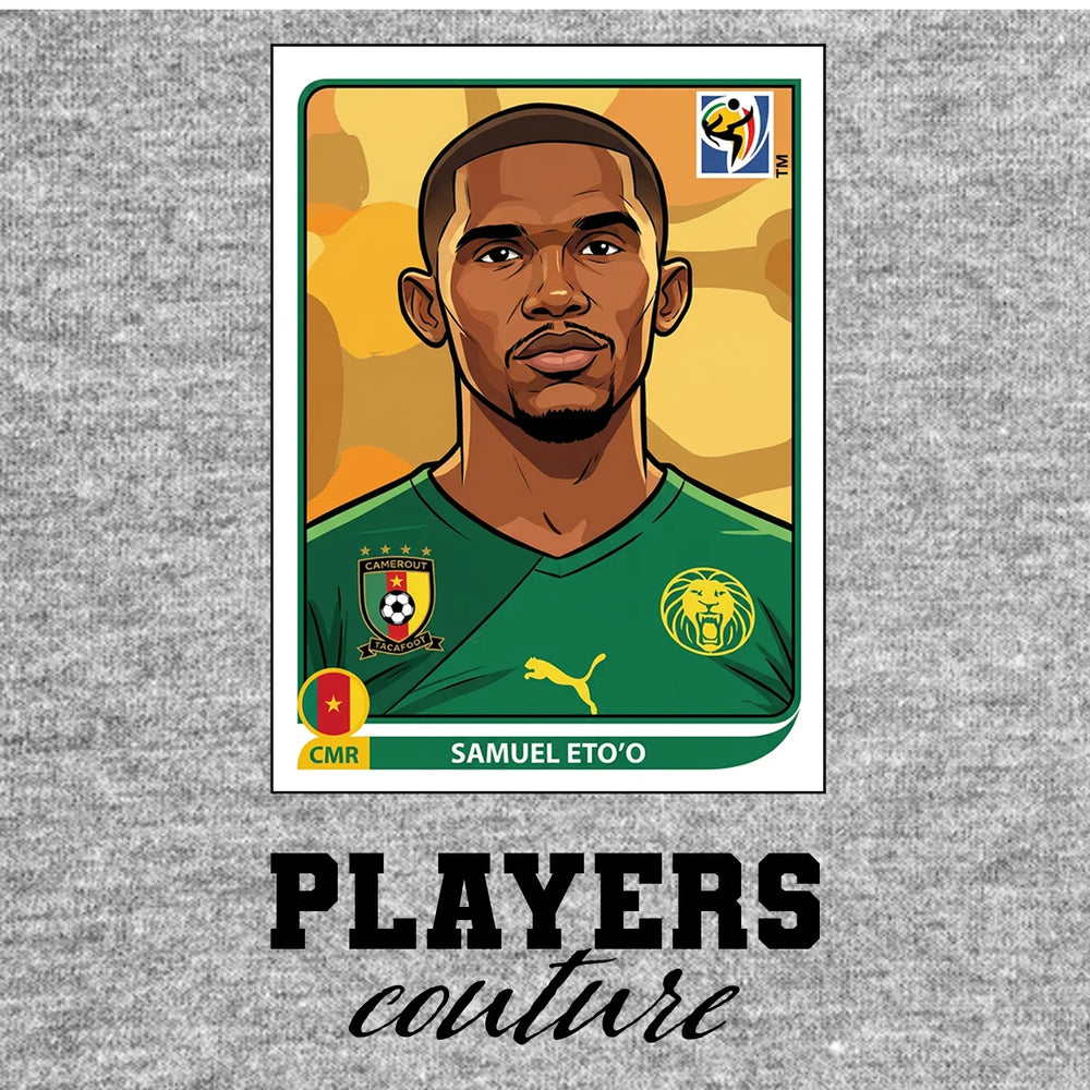 Samuel Eto'o World Cup Sticker Men's T-Shirt – grey close-up detail shot of the Samuel Eto'o World Cup Players Couture logo