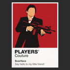 Scarface Tony Montana in a dark suit against the film's stark black-white-red Miami imagery Icon Frame artwork in black