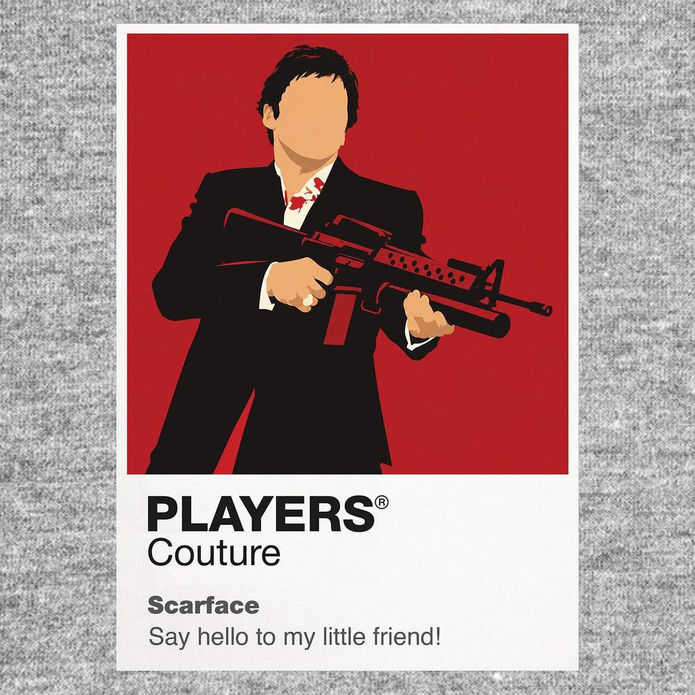 Scarface Tony Montana in a dark suit against the film's stark black-white-red Miami imagery Icon Frame artwork in grey