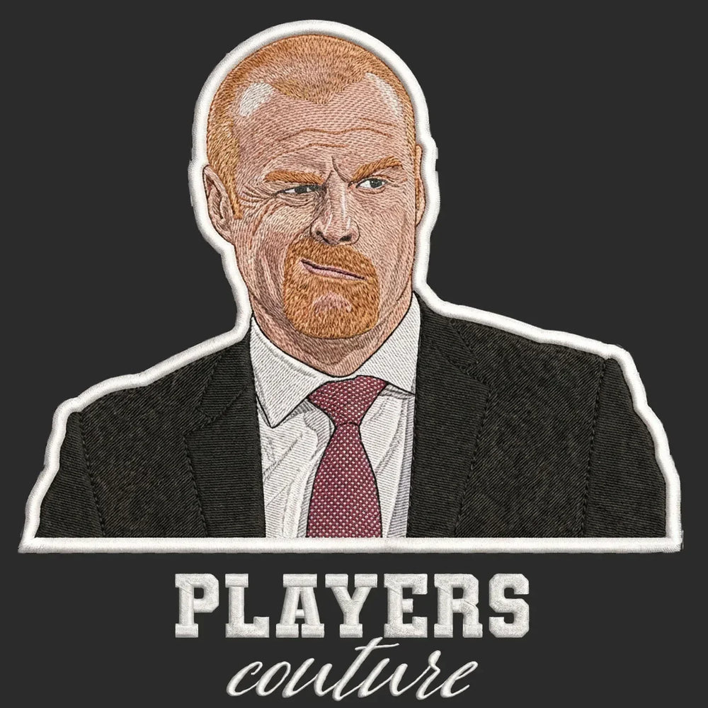 Sean Dyche Badge Men's Hoodie – black close-up detail shot of the Sean Dyche Players Couture logo design