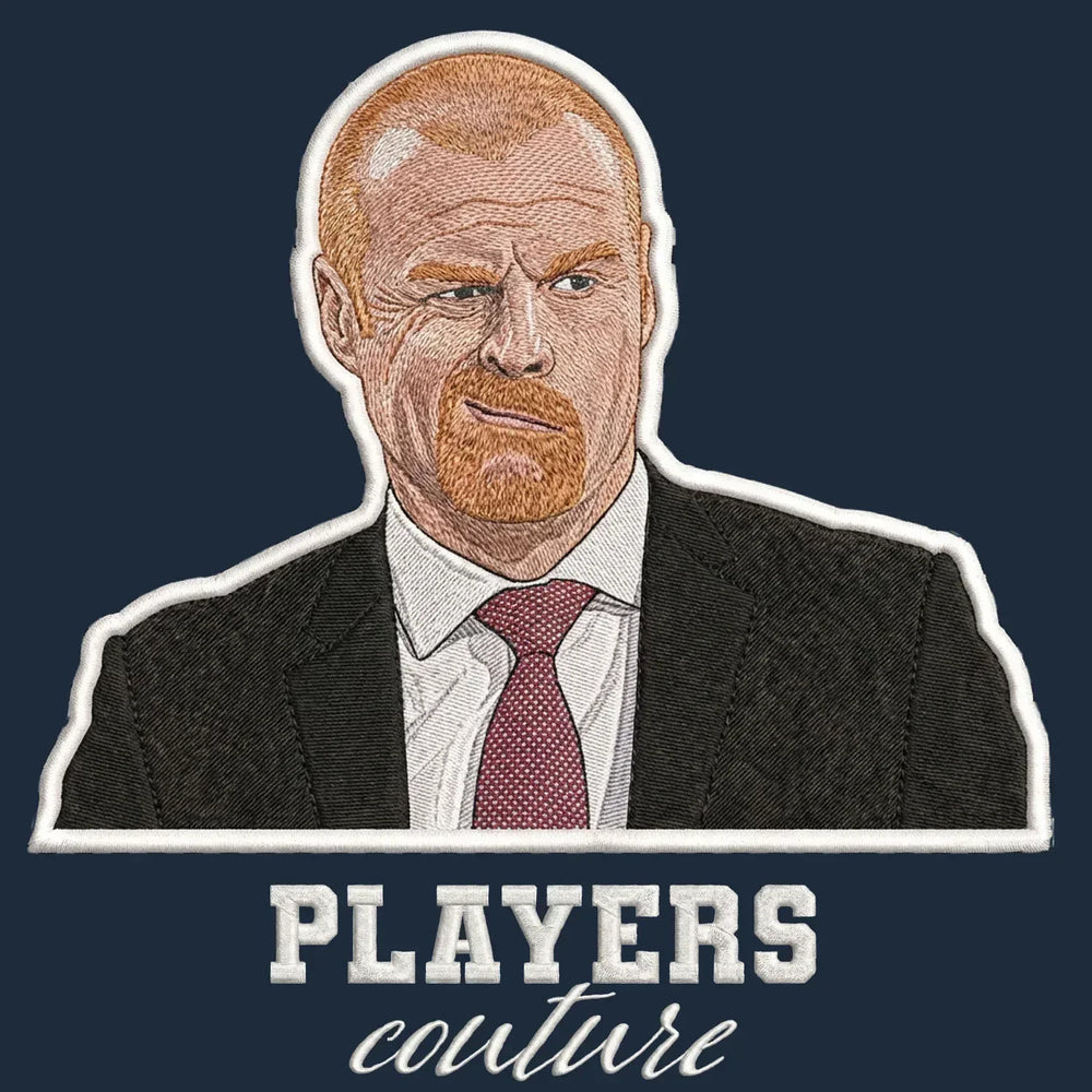 Sean Dyche Badge Men's Hoodie – navy close-up detail shot of the Sean Dyche Players Couture logo design