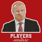Sean Dyche Badge Men's Hoodie – red close-up detail shot of the Sean Dyche Players Couture logo design