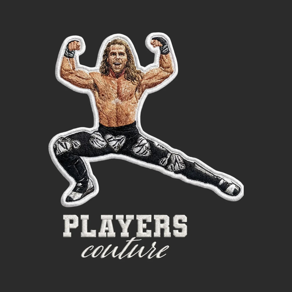 Shawn Michaels Badge Men's Hoodie – white close-up detail shot of the Shawn Michaels Players Couture logo design