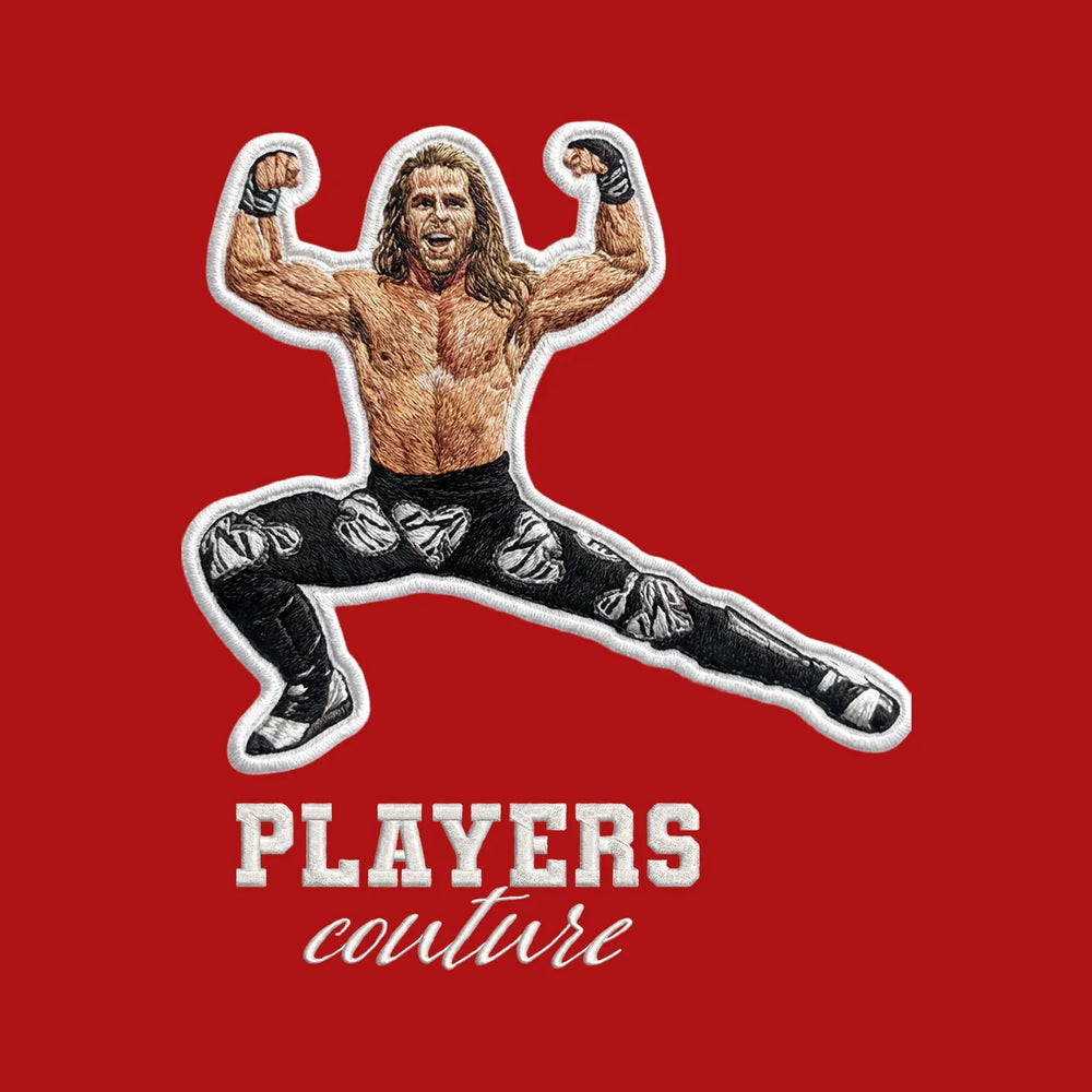 Shawn Michaels Badge Men's Hoodie – white close-up detail shot of the Shawn Michaels Players Couture logo design