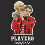 Andriy Shevchenko Badge Men's Hoodie – black close-up detail shot of the Andriy Shevchenko Players Couture logo design