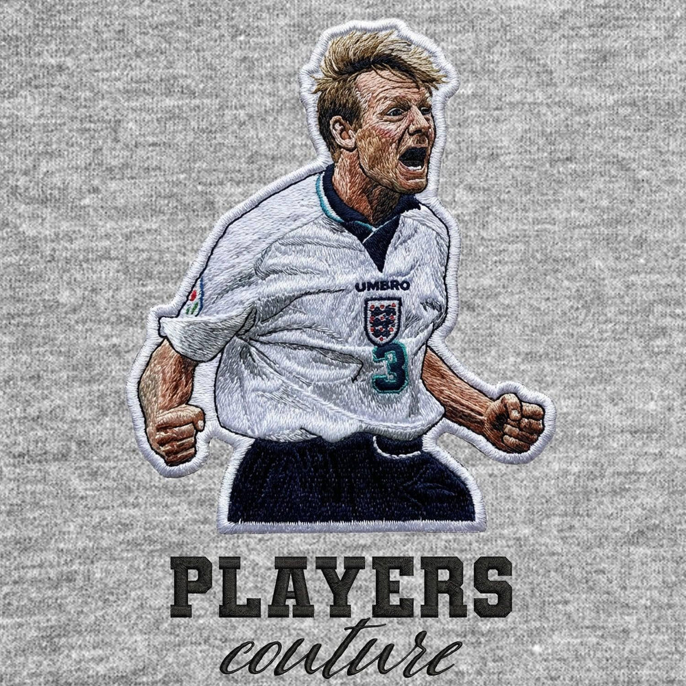 Stuart Pearce Badge Men's Hoodie – grey close-up detail shot of the Stuart Pearce Players Couture logo design