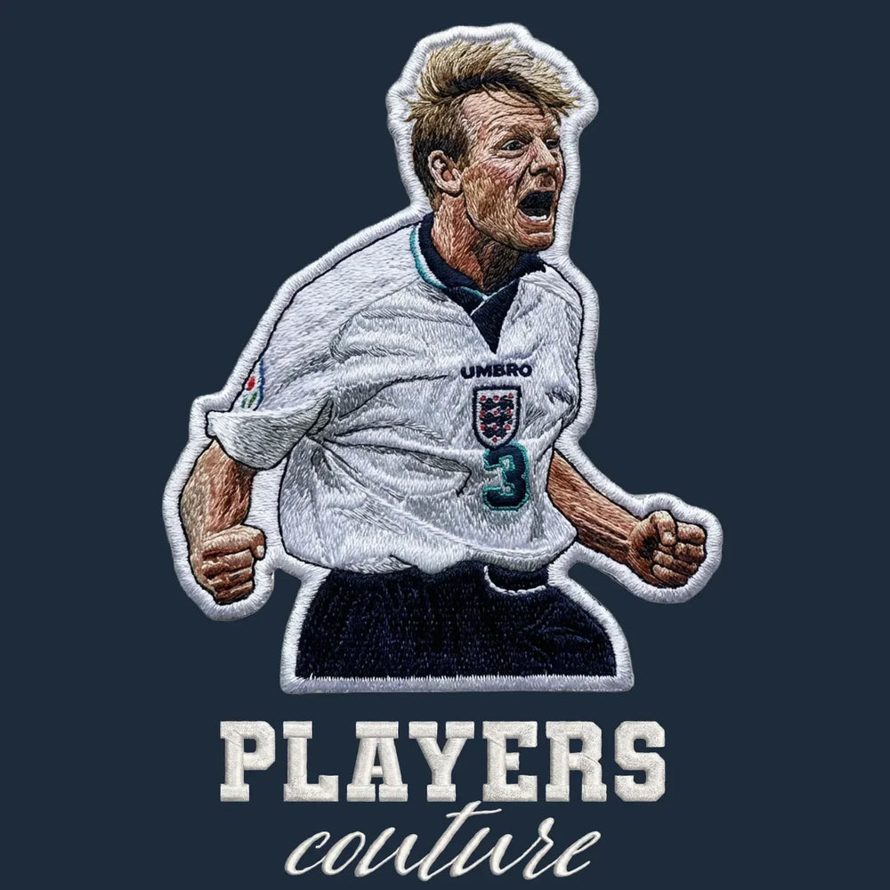 Stuart Pearce Badge Men's Hoodie – navy close-up detail shot of the Stuart Pearce Players Couture logo design