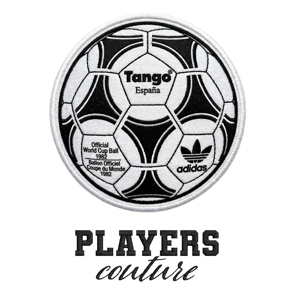 World Cup Tango Ball Badge Men's Hoodie – black close-up detail shot of the World Cup Tango Ball Players Couture logo design