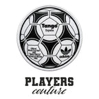 World Cup Tango Ball Badge Men's Hoodie – black close-up detail shot of the World Cup Tango Ball Players Couture logo design