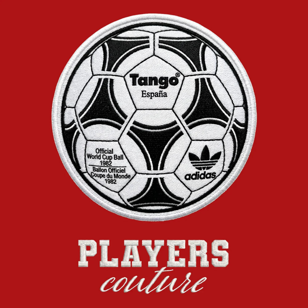 World Cup Tango Ball Badge Men's Hoodie – white close-up detail shot of the World Cup Tango Ball Players Couture logo design