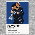 The Bodyguard Rachel Marron and Frank Farmer framed by stage light, formal tailoring and protective distance Icon Frame artwork in grey