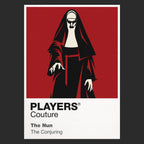 The Nun Valak's white face and black habit emerging from the corridors of a Romanian abbey Icon Frame artwork in black