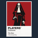 The Nun Valak's white face and black habit emerging from the corridors of a Romanian abbey Icon Frame artwork in navy