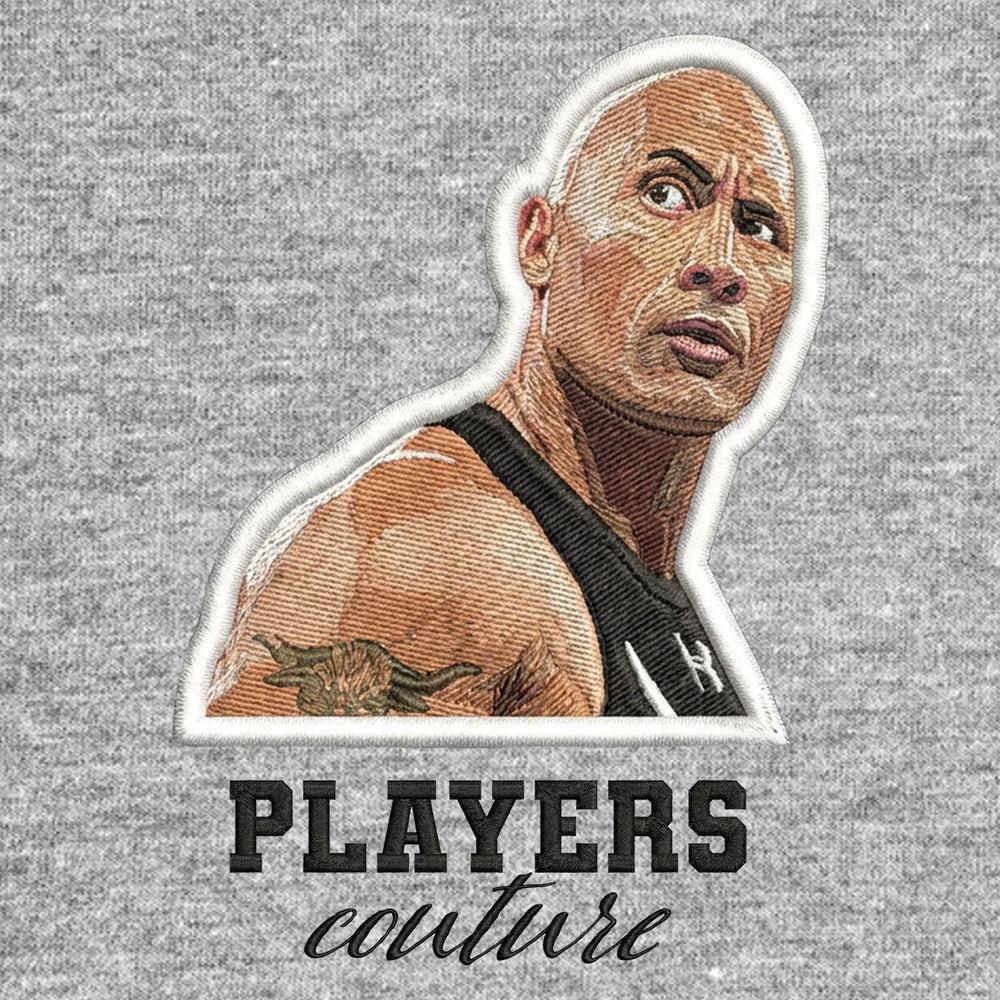 The Rock Badge Men's Hoodie – black close-up detail shot of the The Rock Players Couture logo design