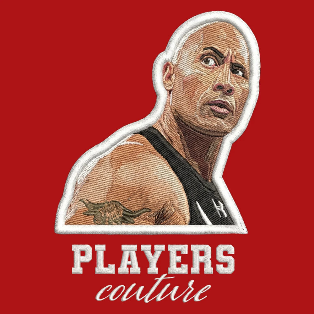 The Rock Badge Men's Hoodie – white close-up detail shot of the The Rock Players Couture logo design